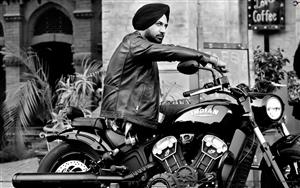 Gippy Grewal poses with Indian Scout motorbike